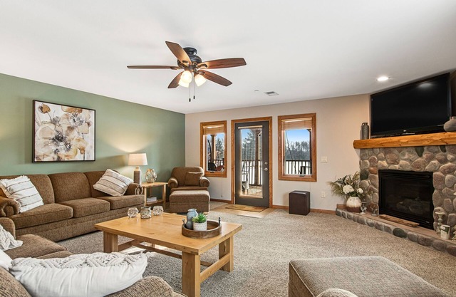 Condo at waterfront resort with golf course views, central AC, W/D, & pool