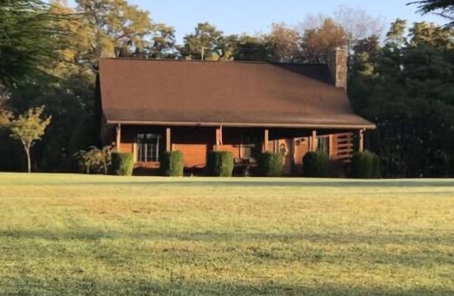 Cooley’s Cottage is a beautiful log home with a hot tub!