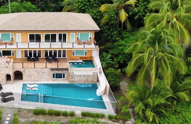 Costa Rica BEACH Castle with WATERSLIDE, WATERFALL, 2 Pools on SANDY BEACH 12ppl