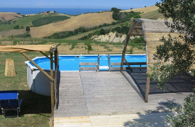 Cosy apartment in villa with pool, A/C, WIFI, hot tub, TV, patio, pets allowed and panoramic view