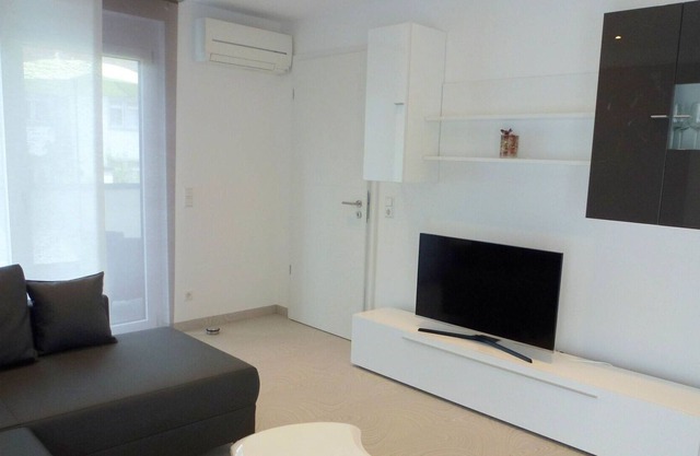 Cosy apartment for 4 people with WIFI, A/C, TV, balcony and parking