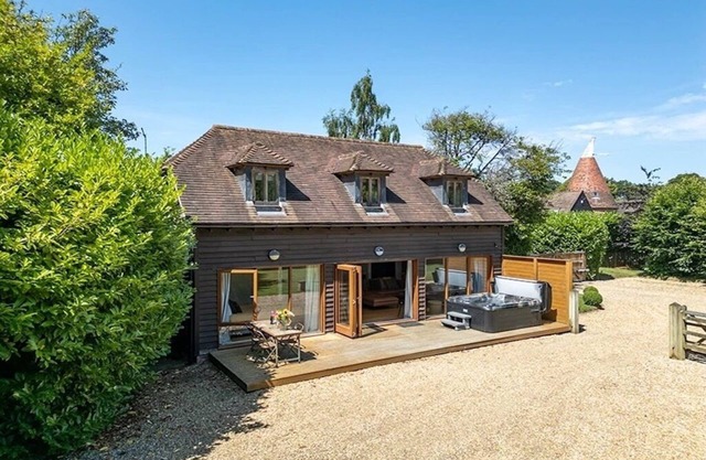 cosy lodge with hot tub on a working farm