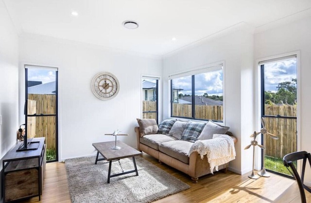 Cozy 4BR Retreat: Workspace Near Shops & Highways