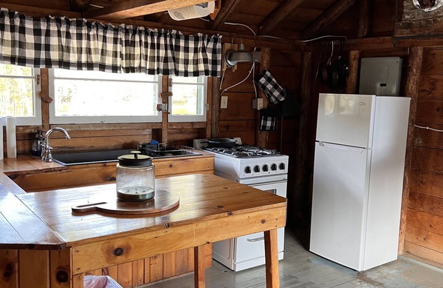 Cozy cabin on the water with fantastic views of Mooselookmeguntic Lake.