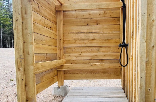 Cozy waterfront property nestled amongst spruce trees.nPet friendly.