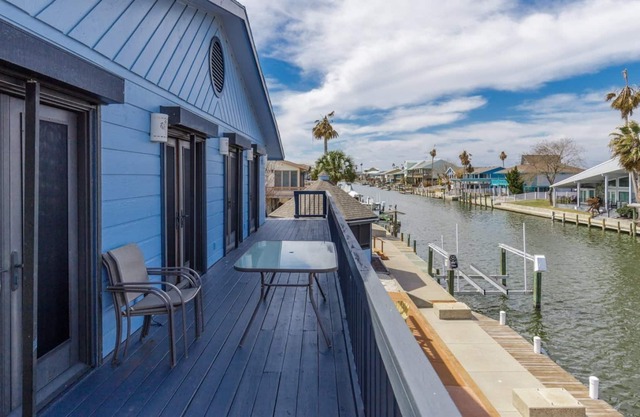 Crazy about fishing? Check out this home on deep canal near Estes Flats, Redfish