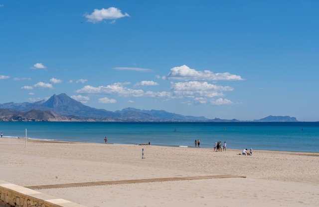 Daylight friendly apartment with sea view and shared outdoor pool.