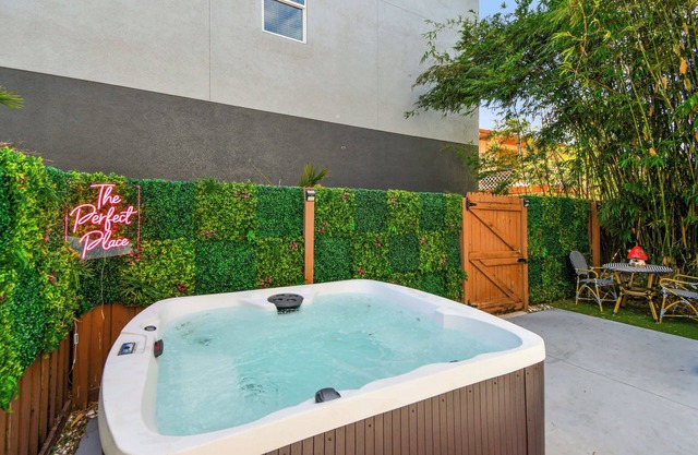 Designer Sun Filled Condo - Walk to Town
