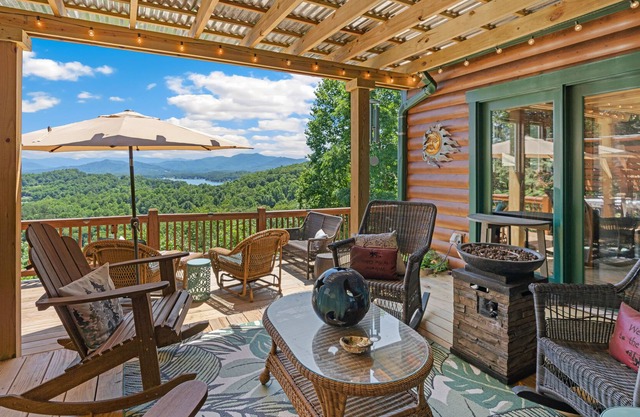 Dog-friendly cabin near lake with mountain view, firepit, balcony, AC, & W/D