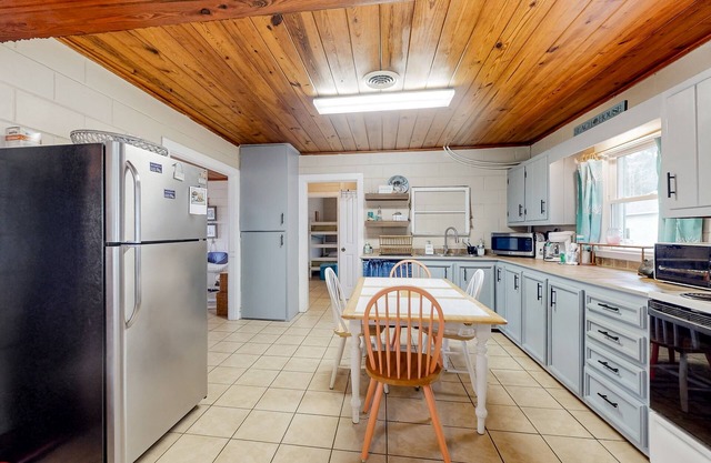 Dog-friendly home near water with foosball, bikes, grill, outdoor shower, & W/D
