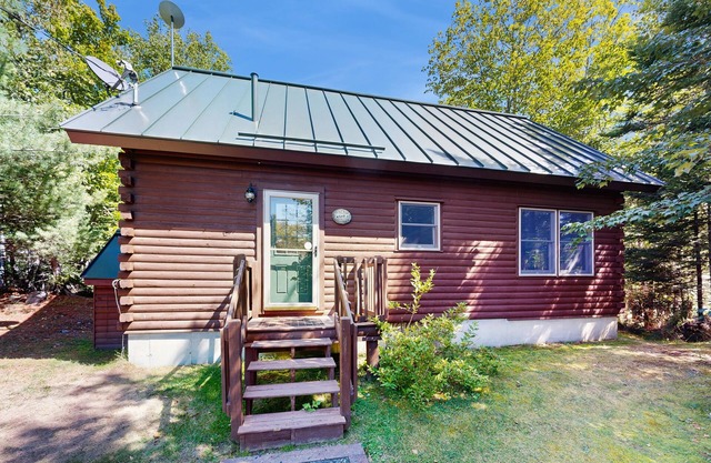 Dog-friendly lakefront home with deck, grill, WiFi, shared dock & water access