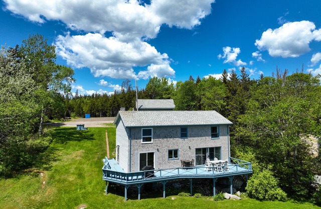 Dog-friendly ocean-view house with expansive deck & grill - snowbirds welcome