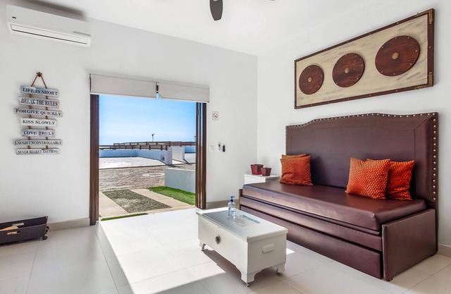 Dog-friendly suite with beach views, outdoor pool, patio, kitchenette, & AC