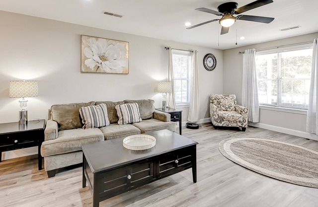 Dog-friendly village home with front porch, grill, backyard, W/D, AC, & desk