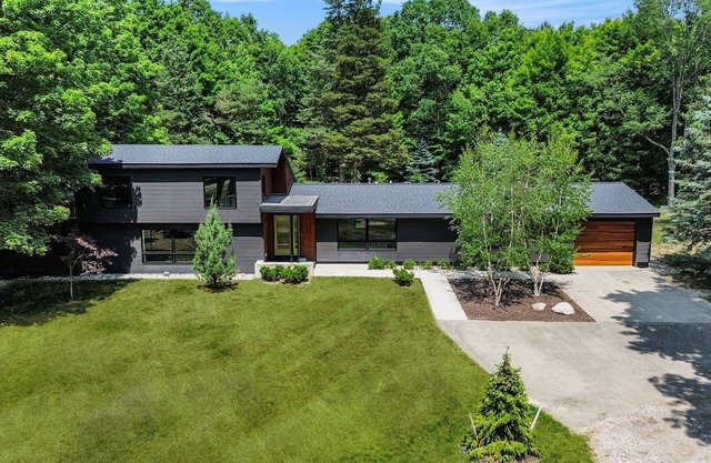 Dunes Lodge is a newly-restored mid-century modern home in Laketown, Michigan