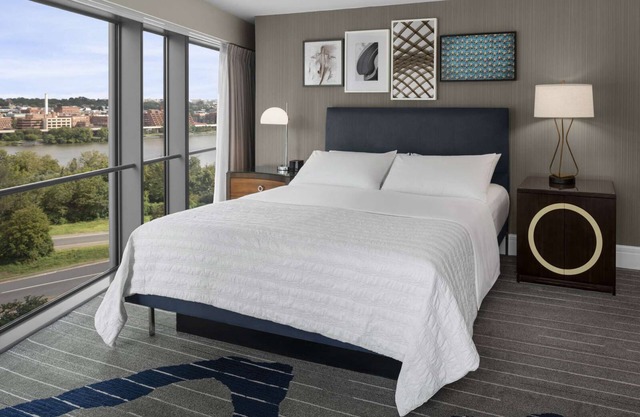 Elevated Stay | Riverfront Dining. Fitness Gym.