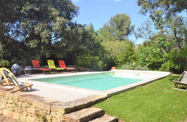 Enjoy a relaxing vacation in this vacation home with pool near the forest.