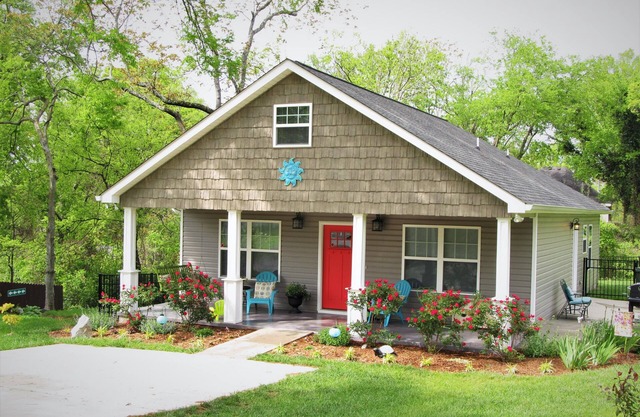 Enjoy the huge southern porch. Grab your sweet tea, Relax with Your Best Friend!