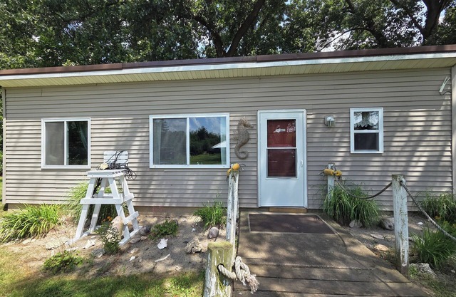 Escape to the quiet countryside and relax at our cozy beach-themed cottage.