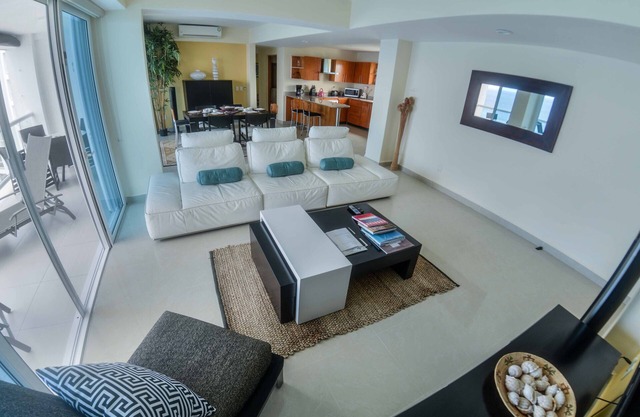 Escape to this amazing Beachfront condo at Peninsula Grand Cozumel!