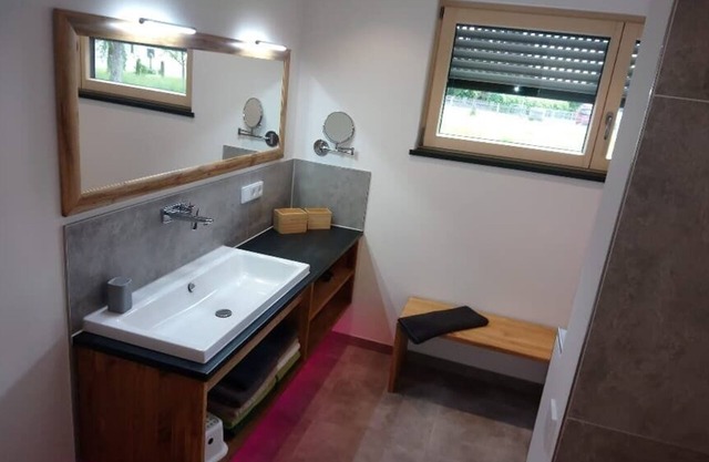 Exclusively furnished holiday home - with bathtub and walk-in experience shower