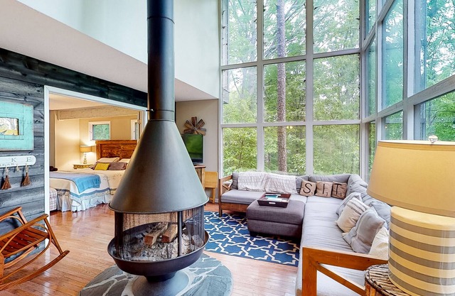 Exquisite waterfront home with balcony, fireplace, W/D, & dog-friendly