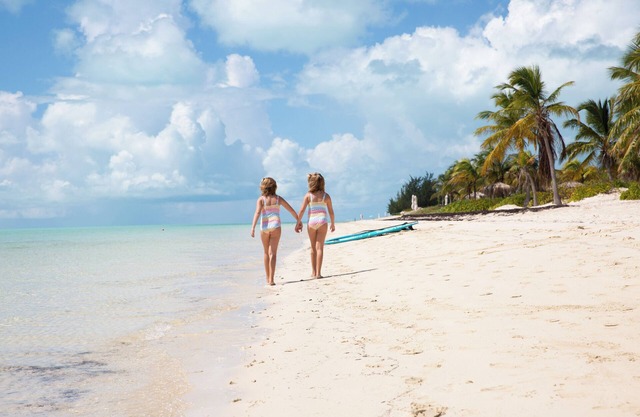 Feel the crisp ocean breeze in this Deluxe Suite!