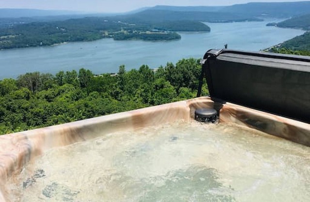 FISH TALES · NO SUNDAY CHECK-INS ,VIEW HOT-TUB FISH TALES