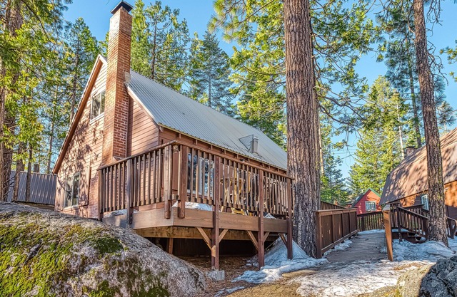 Friendly cabin-style home with private gas grill, wood-burning stove, & deck