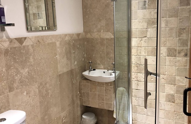 Garden Bank Cottage , on ground level, two bedrooms with two shower rooms