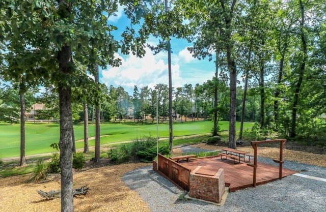 GRANADA GOLF FRONT HOME ON #3 PUTTING GREEN OF GRANADA GOLF COURSE