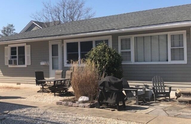 Great location. This ranch style duplex features two bedrooms and one bath. Window air conditioning and nice patio with gas grill, table and chairs. Off street parking. Just a short stroll to the beach and all that Stone Harbor has to offer! Pe