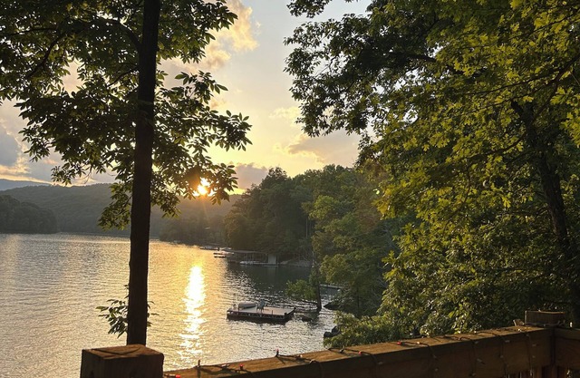 Hickory Harbor lakefront w/dock, grilling deck, and play yard on shady lot!