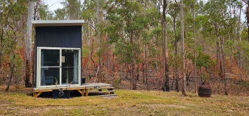Hidden Camp's Loft House by Tiny Away
