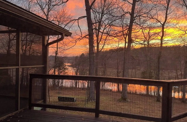 Hideaway on the lake; large mid-century stone ranch in a park-like setting