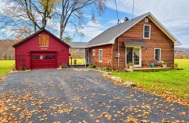 Historic home on 1 acre with snowmobile trails in backyard & mountain views