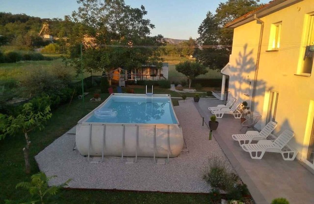 Holiday apartment with outdoor pool