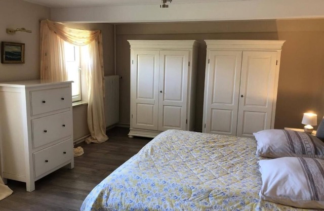 Holiday Home "Großes Reetdachhaus Langenhorn" with Garden, Terrace and Wi-Fi