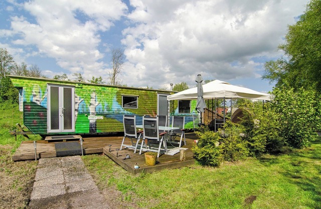 Holiday Home 'Süßes Häuschen Am See' with Private Terrace and Private Garden