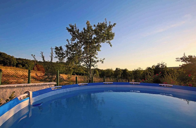 Holiday home with swimming pool and barbecue