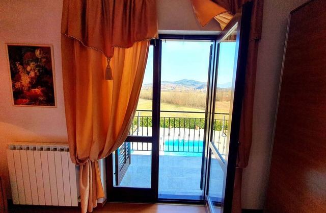 Holiday house with outdoor pool, balcony and close to the beach