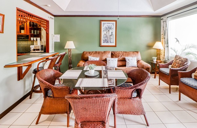 Ideally Located Tropical Escape W/ Lush Gardens, & Shared Pool!