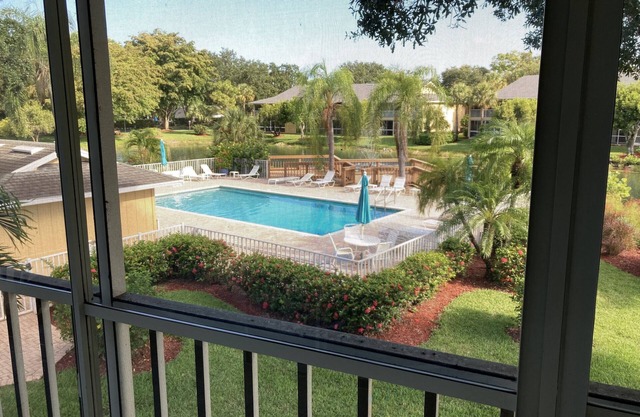 Immaculate, 2 bedroom, 2 bath end unit, next to the pool