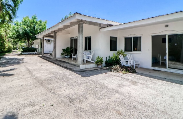 Inviting beachfront Villa w/private beach access, shared pool and gardens
