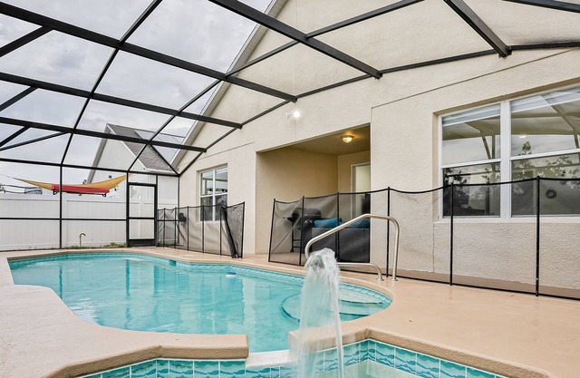 Inviting home near Disney with private pool, patio, gas grill & game area