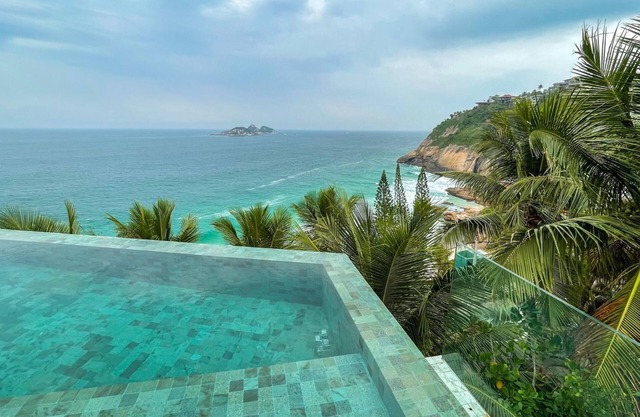 It is located in a stunning and privileged setting on Joatinga beach.
