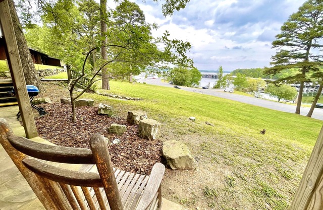 Lake View Queen Guest Room With Two Queens, Sleeper Sofa And Deck Overlooking Lake Ouachita. 1 Bedroom Hotel Room by RedAwning