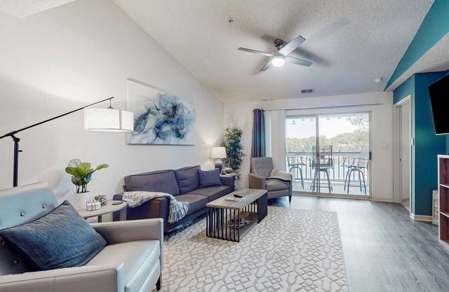 Lakefront apartment with private W/D, boat slip, and community pool