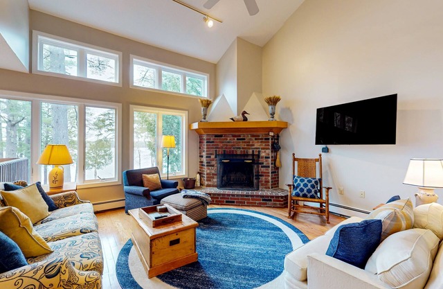 Lakefront condo with on-site pool, dock, swimming, firepit, & tennis