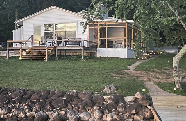 Lakefront home on the main channel w/beautiful view and a boat ramp next door!